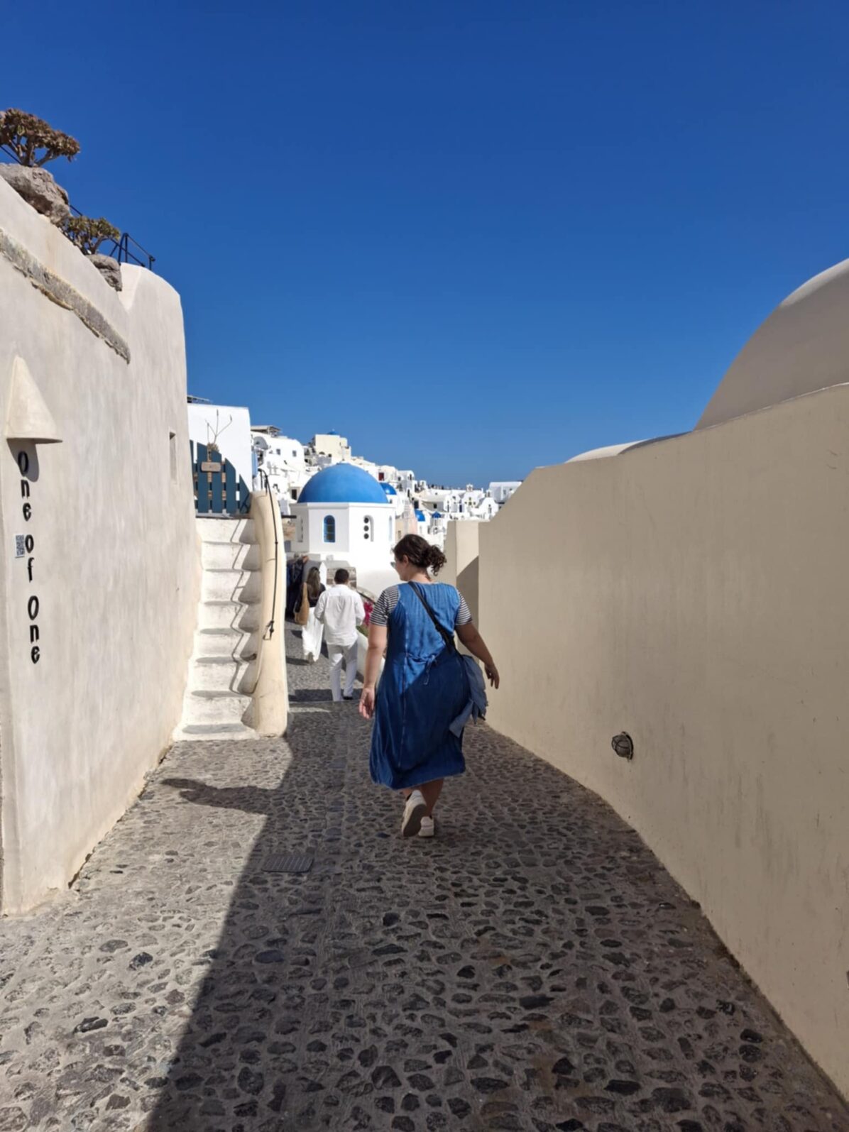 Walking the cobbled streets of Santorini Walking the cobbled streets of Santorini